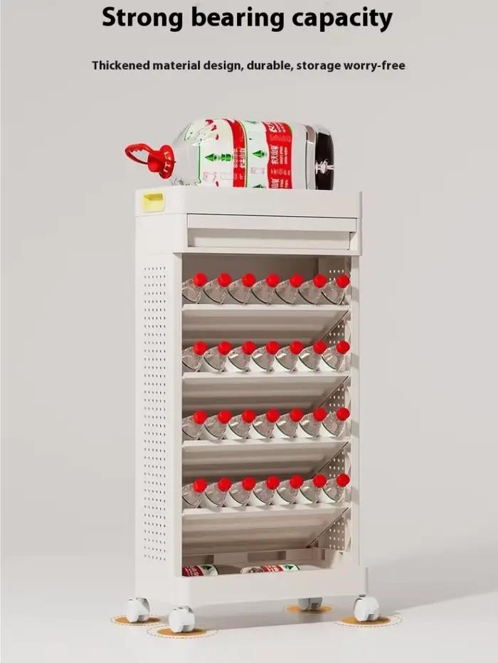 Petite bibliothèque à côté du bureau avec roulettes